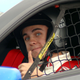 A photo of Frankie Muniz in a racing car in 2004